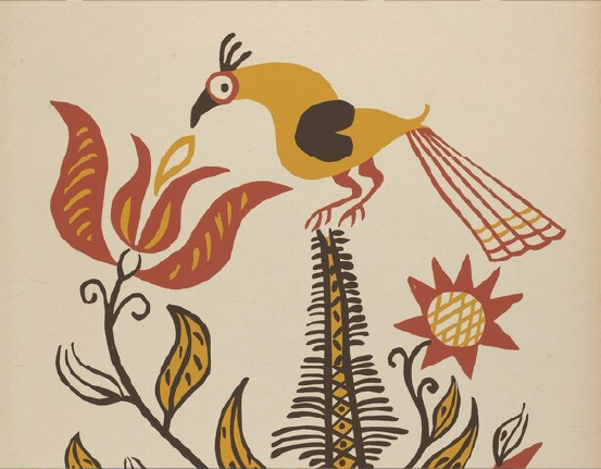 A bird perched on a plant